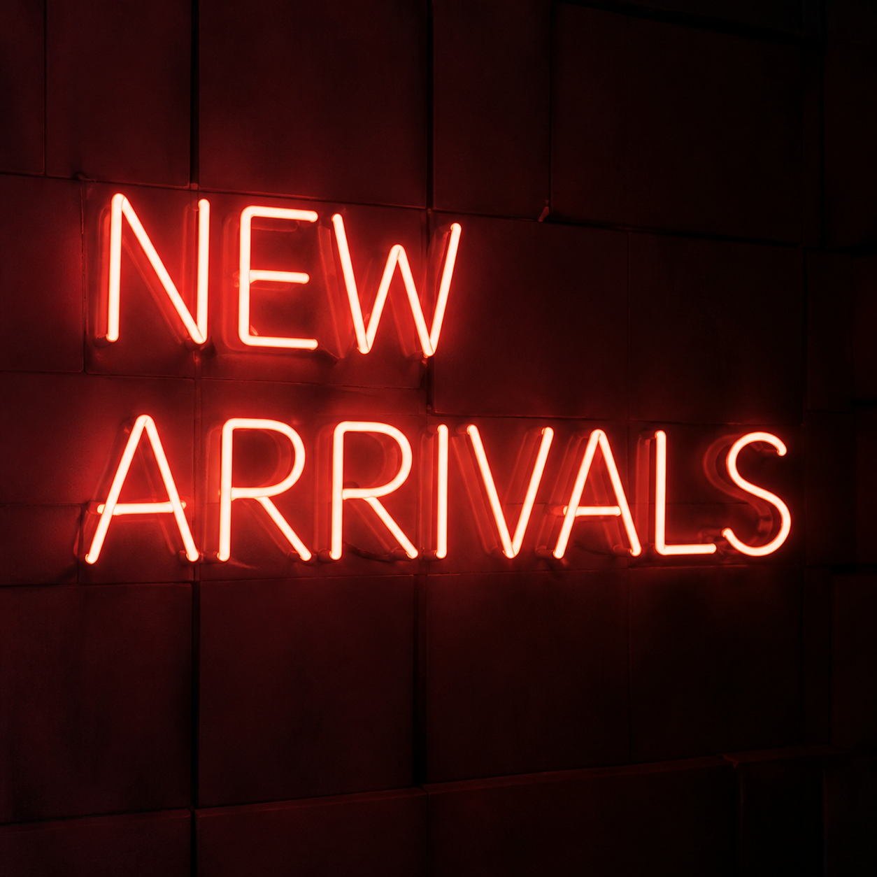 Bespoke neon illuminating a premium retail display