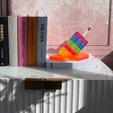 Neon rainbow ice lolly decorative object for colourful shelf styling