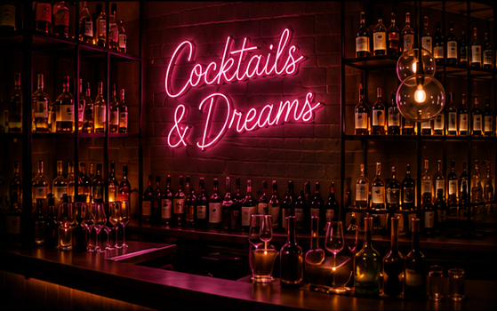 Bespoke neon sign illuminating a bar interior