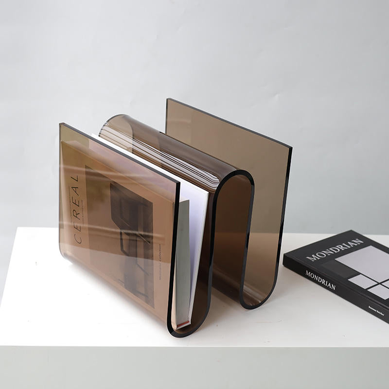 Archive smoke acrylic magazine holder by BAG&BONES storing books and magazines in a modern sculptural design.