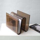 Archive smoke acrylic magazine holder by BAG&BONES storing books and magazines in a modern sculptural design.