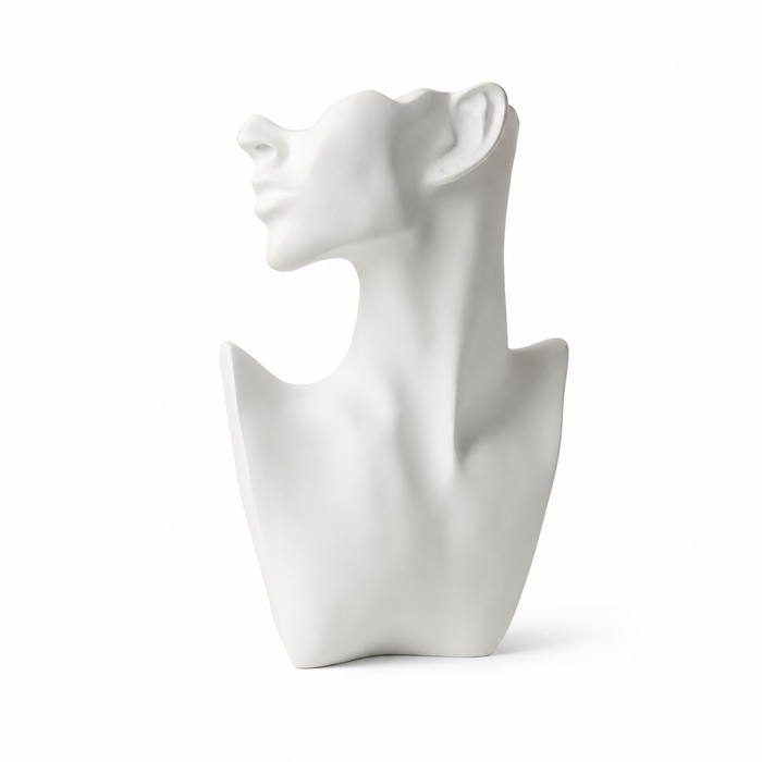 Eve abstract face sculpture by BAG&BONES featuring a minimalist white sculptural bust with elongated neck and contemporary profile on a white background.