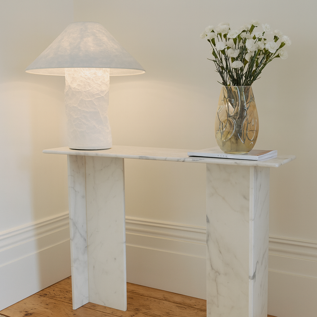 Off-white paper table lamp with wide conical shade and cylindrical base