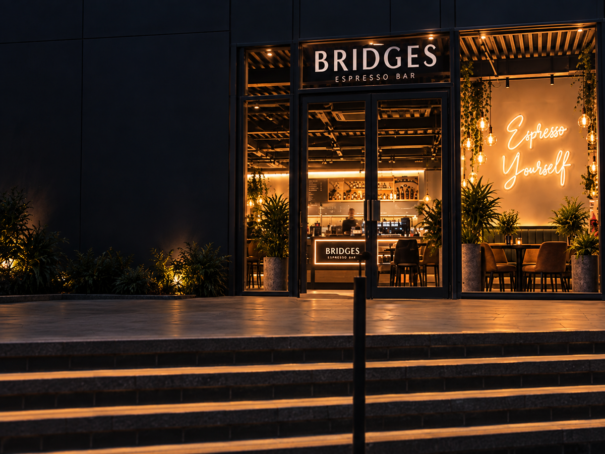 Bespoke neon sign illuminating a bar interior