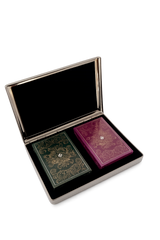 Open polished case showing two premium playing card decks in contrasting colours inside a luxury storage box