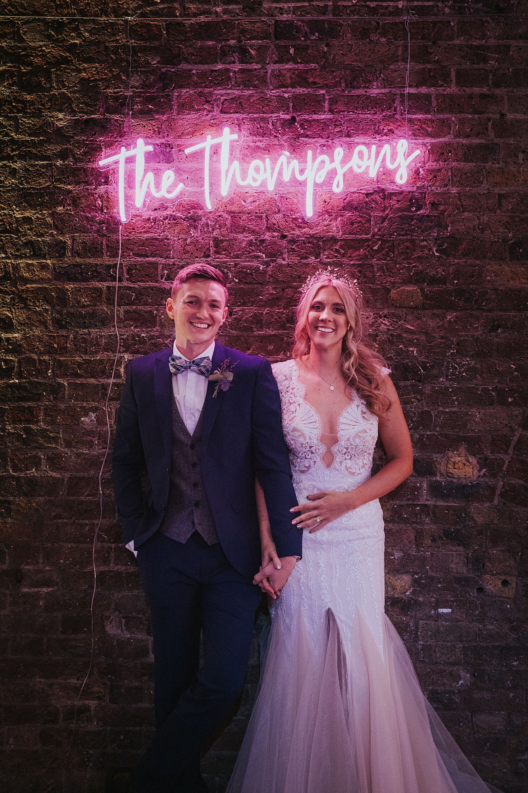 Bespoke BAG&BONES wedding neon sign displayed at a real wedding.