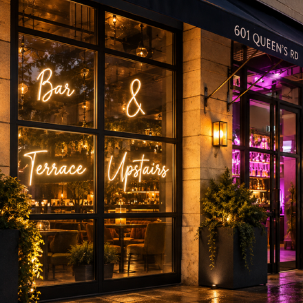 Bespoke neon entrance sign at a bar
