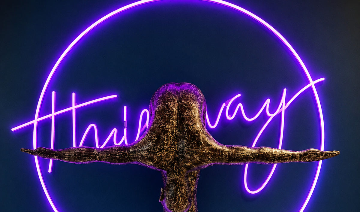 Bespoke purple neon installation behind a sculpture at Rudding Park Hotel